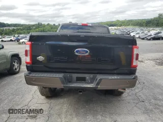 2023 Ford F-150 XL with VIN 1FTEW1C83PFA84267, listed as a Copart auction lot 65042545 with 54,508 mi miles and Salvage title. Bid and sale history available at DreamBid. Image 6.