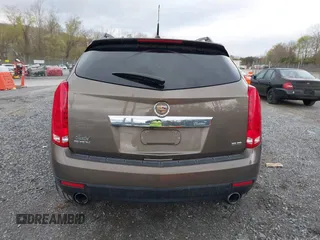 2014 Cadillac SRX Performance Collection with VIN 3GYFNCE33ES570472, listed as a IAAI auction lot 41971511 with 200,811 mi miles. Bid and sale history available at carsss.com. Image 16.
