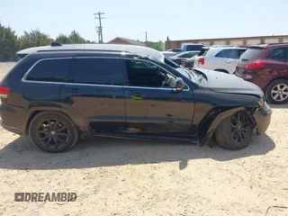 2016 Jeep Grand Cherokee Overland with VIN 1C4RJFCG5GC408390, listed as a IAAI auction lot 42140038 with 140,507 mi miles and . Bid and sale history available at DreamBid. Image 13.