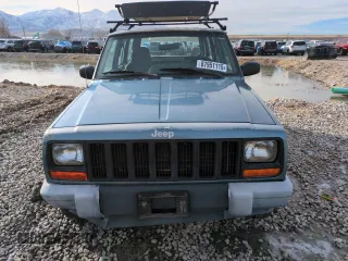 1999 Jeep Cherokee SE with VIN 1J4FF28S5XL646812, listed as a Copart auction lot 87951115 with 230,161 mi miles and Clean title. Bid and sale history available at DreamBid. Image 5.
