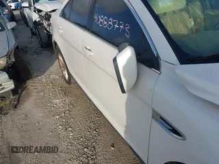 2015 Ford Taurus SEL z VIN 1FAHP2E81FG105404, wystawiony jako IAAI lot #40888773 z przebiegiem Nie podano mil oraz . Historia ofert i sprzedaży dostępna na DreamBid. Obrazek 16.
