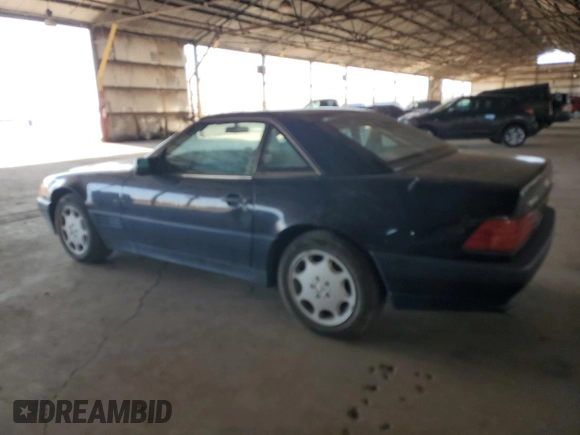 1994 Mercedes-Benz SL 5.0L with VIN WDBFA67E2RF092295, listed as a Copart auction lot 52933945 with 89,085 mi miles and Clean title. Bid and sale history available at DreamBid. Image 2.