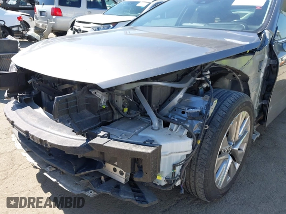 2021 Toyota Mirai XLE with VIN JTDAAAAAXMA002000, listed as a IAAI auction lot 42207752 with 33,017 mi miles and . Bid and sale history available at DreamBid. Image 6.