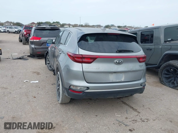 2020 Kia Sportage LX with VIN KNDPM3AC5L7720838, listed as a IAAI auction lot 41458808 with 52,689 mi miles and . Bid and sale history available at DreamBid. Image 3.