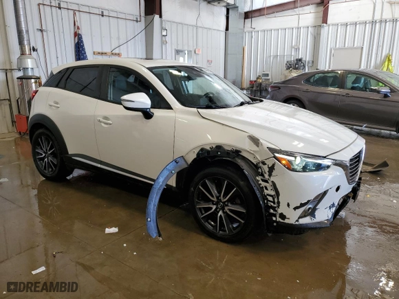 2018 Mazda CX-3 Grand Touring with VIN JM1DKFD7XJ0321776, listed as a Copart auction lot 49093765 with 94,770 mi miles and Clean Title. Bid and sale history available at carsss.com. Image 4.