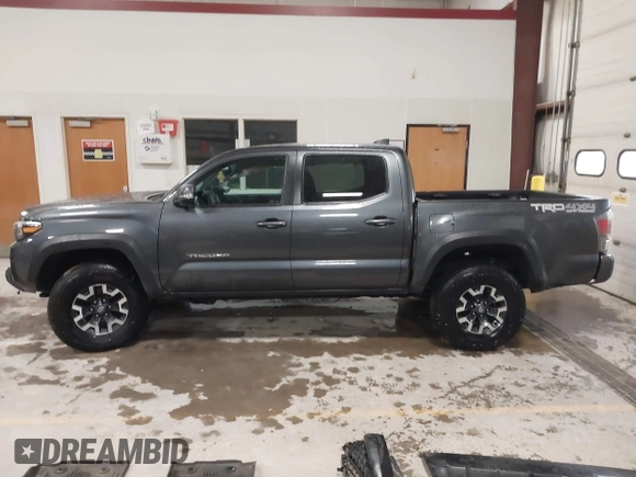 2021 Toyota Tacoma SR z VIN 3TMCZ5AN2MM444249, wystawiony jako IAAI lot #41942146 z przebiegiem 59 429 mil mil oraz . Historia ofert i sprzedaży dostępna na DreamBid. Obrazek 15.