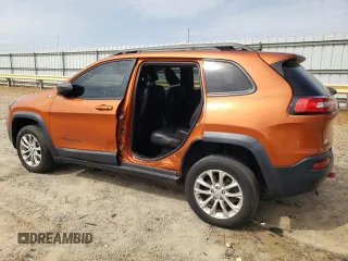 2015 Jeep Cherokee Trailhawk with VIN 1C4PJMBB5FW600455, listed as a Copart auction lot 53859365 with 164,420 mi miles and Salvage Title. Bid and sale history available at DreamBid. Image 2.