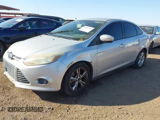 2013 Ford Focus SE with VIN 1FADP3F29DL153736, listed as a IAAI auction lot 42006149 with 176,935 mi miles. Bid and sale history available at carsss.com. Image 2.