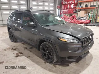 2016 Jeep Cherokee Latitude with VIN 1C4PJLCSXGW137190, listed as a IAAI auction lot 41563823 with 159,586 mi miles. Bid and sale history available at carsss.com. Image 1.