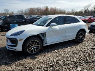 2024 Porsche Macan with VIN WP1AA2A54RLB05772, listed as a Copart auction lot 50227815 with 6,145 mi miles and Salvage Title. Bid and sale history available at DreamBid. Image 1.