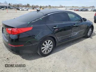 2015 Kia Optima EX with VIN 5XXGN4A72FG517116, listed as a Copart auction lot 48728505 with 140,351 mi miles and Salvage Title. Bid and sale history available at carsss.com. Image 3.