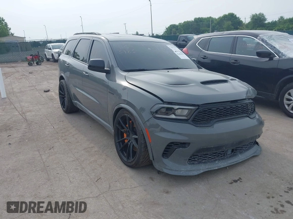 2023 Dodge Durango R/T z VIN 1C4SDJCT4PC611487, wystawiony jako IAAI lot #42681051 z przebiegiem 20 438 mil mil oraz . Historia ofert i sprzedaży dostępna na DreamBid. Obrazek 1.