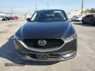 2021 Mazda CX-5 Touring with VIN JM3KFBCM8M0495899, listed as a Copart auction lot 51049235 with 31,164 mi miles and Salvage Title. Bid and sale history available at carsss.com. Image 5.