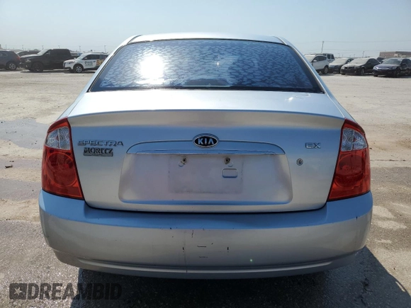 2006 Kia Spectra EX with VIN KNAFE121865277527, listed as a Copart auction lot 74613214 with 123,368 mi miles and Salvage Title. Bid and sale history available at carsss.com. Image 6.
