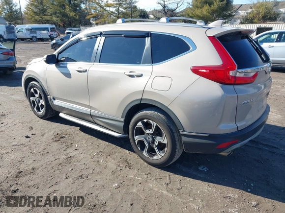 2017 Honda CR-V Touring with VIN 5J6RW2H94HL013536, listed as a IAAI auction lot 41577317 with 97,132 mi miles. Bid and sale history available at carsss.com. Image 3.