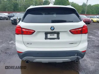 2018 BMW X1 xDrive28i with VIN WBXHT3C38J5L31322, listed as a IAAI auction lot 42260190 with 70,266 mi miles and . Bid and sale history available at DreamBid. Image 16.