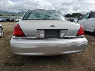 2004 Ford Crown Victoria LX с VIN 2FAHP74W04X168238, выставлен на аукционе Copart как лот 50842995 с пробегом 63 313 миль миль и Списание • Salvage title. История ставок и продаж доступна на DreamBid. Изображение 6.