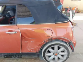 2005 MINI Convertible with VIN WMWRF334X5TF61026, listed as a IAAI auction lot 42125720 with 117,908 mi miles and . Bid and sale history available at DreamBid. Image 6.