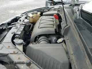 2010 Chevrolet Traverse LS z VIN 1GNLREED8AJ197191, wystawiony jako IAAI lot #42512569 z przebiegiem 167 169 mil mil oraz . Historia ofert i sprzedaży dostępna na DreamBid. Obrazek 19.