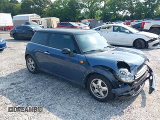 2009 MINI Hardtop with VIN WMWMF33539TW77321, listed as a IAAI auction lot 42376100 with 136,674 mi miles and . Bid and sale history available at DreamBid. Image 1.