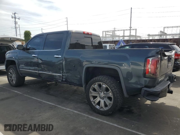 2017 GMC Sierra 1500 Denali with VIN 3GTU2PEJ6HG172367, listed as a Copart auction lot 53167045 with 134,015 mi miles and Salvage Title. Bid and sale history available at DreamBid. Image 2.