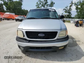 2000 Ford F-150 XL with VIN 1FTZF1727YNB38782, listed as a Copart auction lot 55749405 with 195,440 mi miles and Salvage title. Bid and sale history available at DreamBid. Image 5.