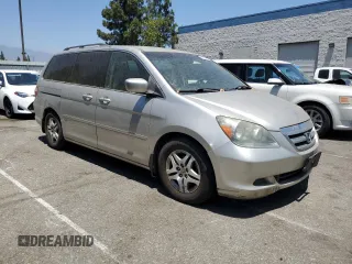 2006 Honda Odyssey EX with VIN 5FNRL38406B453939, listed as a Copart auction lot 62784155 with 86,635 mi miles and Clean title. Bid and sale history available at DreamBid. Image 4.