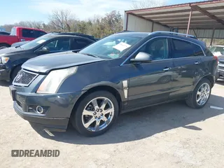 2012 Cadillac SRX Performance Collection with VIN 3GYFNBE32CS604313, listed as a IAAI auction lot 41666975 with 1 mi miles. Bid and sale history available at carsss.com. Image 2.