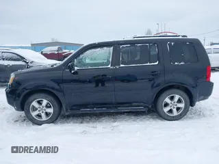 2010 Honda Pilot EX-L z VIN 5FNYF4H5XAB502493, wystawiony jako IAAI lot #41618427 z przebiegiem 123 829 mil mil oraz . Historia ofert i sprzedaży dostępna na DreamBid. Obrazek 14.