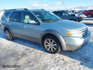 2008 Ford Taurus X SEL with VIN 1FMDK05W78GA20642, listed as a IAAI auction lot 41330080 with 128,928 mi miles. Bid and sale history available at carsss.com. Image 1.