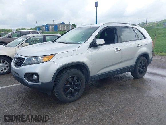 2011 Kia Sorento LX with VIN 5XYKT4A14BG074310, listed as a IAAI auction lot 42119815 with 215,660 mi miles. Bid and sale history available at carsss.com. Image 2.