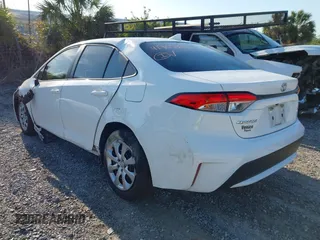 2020 Toyota Corolla LE with VIN 5YFEPRAEXLP092941, listed as a IAAI auction lot 41902363 with 62,847 mi miles. Bid and sale history available at carsss.com. Image 3.