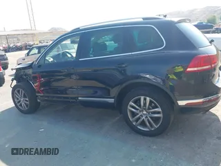 2016 Volkswagen Touareg Sport with VIN WVGEF9BP7GD010252, listed as a IAAI auction lot 42465165 with Not provided miles and . Bid and sale history available at DreamBid. Image 15.