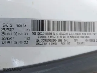 2016 Dodge Grand Caravan Canada Value Package with VIN 2C4RDGBG6GR343068, listed as a IAAI auction lot 42037324 with 202,679 mi miles. Bid and sale history available at carsss.com. Image 9.