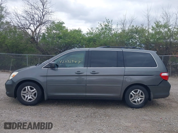 2007 Honda Odyssey EX-L with VIN 5FNRL38767B406636, listed as a IAAI auction lot 42032947 with 228,139 mi miles and . Bid and sale history available at carsss.com. Image 14.