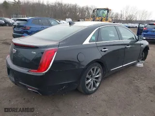 2018 Cadillac XTS Luxury with VIN 2G61N5S34J9158992, listed as a IAAI auction lot 41320371 with 270,030 mi miles. Bid and sale history available at carsss.com. Image 4.