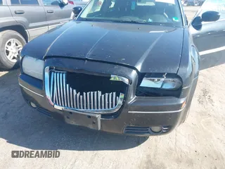 2005 Chrysler 300 with VIN 2C3JA53G55H122612, listed as a IAAI auction lot 41971677 with Not Provided miles. Bid and sale history available at carsss.com. Image 6.
