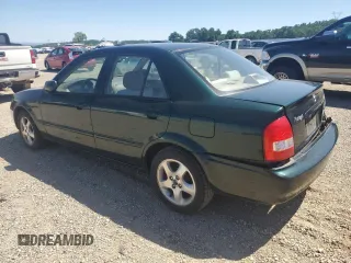 2002 Mazda Protege DX with VIN JM1BJ225121567924, listed as a Copart auction lot 54847545 with 93,653 mi miles and Salvage Title. Bid and sale history available at DreamBid. Image 2.
