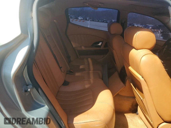 2005 Maserati Quattroporte z VIN ZAMCE39A650019263, wystawiony jako Copart lot #48780445 z przebiegiem Nie podano mil oraz Czysty tytuł • Clean title. Historia ofert i sprzedaży dostępna na DreamBid. Obrazek 10.