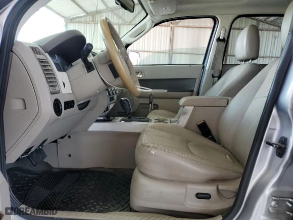 2010 Mercury Mariner Premier with VIN 4M2CN8HG2AKJ00812, listed as a Copart auction lot 61412784 with 215,509 mi miles and Salvage Title. Bid and sale history available at carsss.com. Image 7.
