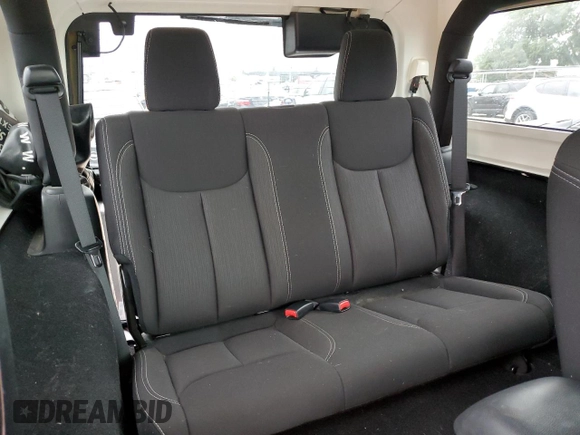 2015 Jeep Wrangler Sahara z VIN 1C4AJWBG2FL614702, wystawiony jako Copart lot #53516315 z przebiegiem 91 899 mil mil oraz Szkoda całkowita • Salvage title. Historia ofert i sprzedaży dostępna na DreamBid. Obrazek 11.
