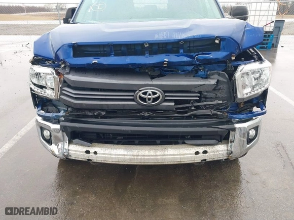 2014 Toyota Tundra 4WD Truck SR5 with VIN 5TFDY5F19EX412813, listed as a IAAI auction lot 41652585 with 164,091 mi miles. Bid and sale history available at carsss.com. Image 6.