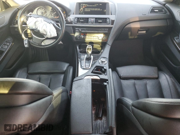 2014 BMW 6 Series 640i z VIN WBA6A0C58EDZ04545, wystawiony jako Copart lot #71086984 z przebiegiem 99 048 mil mil oraz Szkoda całkowita • Salvage title. Historia ofert i sprzedaży dostępna na DreamBid. Obrazek 8.