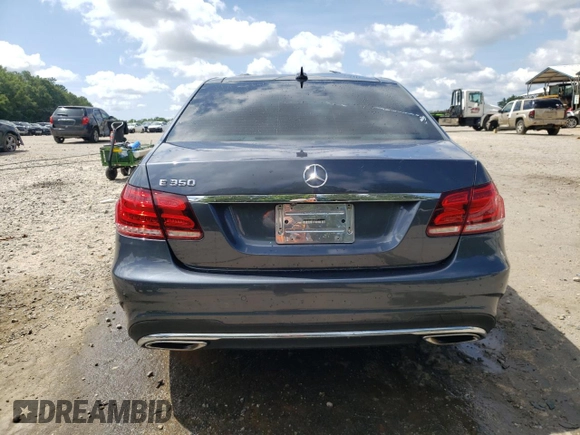 2014 Mercedes-Benz E 350 Sport with VIN WDDHF5KB7EB038257, listed as a Copart auction lot 61251595 with 110,814 mi miles and Salvage title. Bid and sale history available at DreamBid. Image 6.