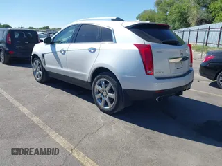 2011 Cadillac SRX Turbo Premium Collection with VIN 3GYFNKE68BS532056, listed as a IAAI auction lot 42447059 with 104,969 mi miles and . Bid and sale history available at DreamBid. Image 3.