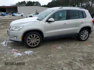 2010 Volkswagen Tiguan with VIN WVGAV9AX7AW514556, listed as a Copart auction lot 45373655 with 94,751 mi miles and Salvage Title. Bid and sale history available at DreamBid. Image 1.