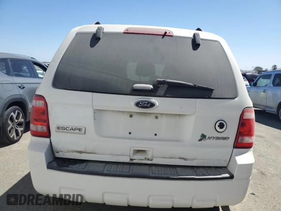 2011 Ford Escape Hybrid z VIN 1FMCU5K39BKA88197, wystawiony jako Copart lot #50896195 z przebiegiem 186 007 mil mil oraz Czysty tytuł • Clean title. Historia ofert i sprzedaży dostępna na DreamBid. Obrazek 6.