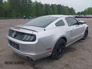 2013 Ford Mustang V6 with VIN 1ZVBP8AM1D5280893, listed as a IAAI auction lot 41951527 with 43,623 mi miles. Bid and sale history available at carsss.com. Image 4.