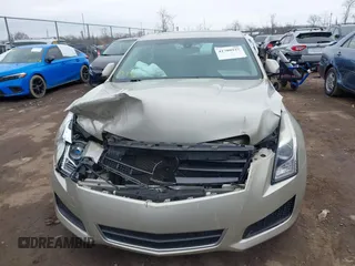 2013 Cadillac ATS z VIN 1G6AA5RA5D0131069, wystawiony jako IAAI lot #41708927 z przebiegiem 166 624 mil mil oraz . Historia ofert i sprzedaży dostępna na DreamBid. Obrazek 12.