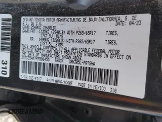 2023 Toyota Tacoma SR with VIN 3TMCZ5AN7PM586455, listed as a Copart auction lot 58191165 with Not provided miles and Salvage title. Bid and sale history available at DreamBid. Image 12.